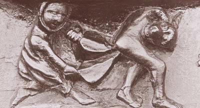 A Great Malvern misericord showing a woman blowing out a demon